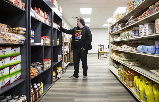 Thomas Lovecraft browses items in Amin Grocery in downtown Willmar on Thursday, March 9, 2023.Macy Moore / West Central Tribune