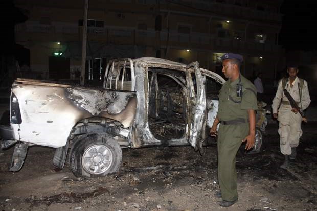 Security forces stand at the site of a car bomb attack against the Hotel Maka in Mogadishu Nov. 8, 2013.