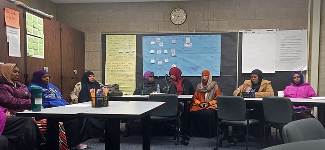 Newly immigrated Somali parents attend the Waalidow Indhaha Furr session at Andersen United Community School on Dec. 2, 2015 in Minneapolis. Vanessa Nyarko