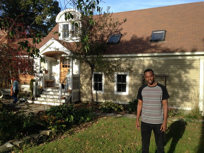 Somali Abdi Nor Iftin on Sunday, Oct. 4, in front of his host mother Sharon McDonnell’s home in North Yarmouth, where he first lived after coming to the U.S. from Kenya on a visa he won through the State Department’s green card lottery.