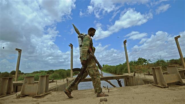 A Somali soldier patrols in Jowhar, some 90 kilometers north of the capital Mogadishu, on October 9, 2015. (AFP)