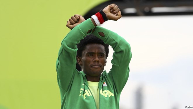 FILE - Ethiopian distance runner Feyisa Lilesa made headlines when he crossed his wrists above his head, a symbol that has become the rallying cry for protests in the Oromia region of Ethiopia.