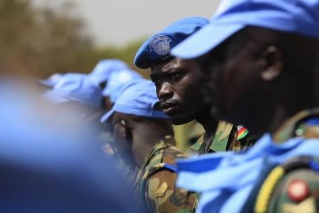 Ghanian U.N. peacekeepers stand at attention upon arriving in Juba February 28, 2014.