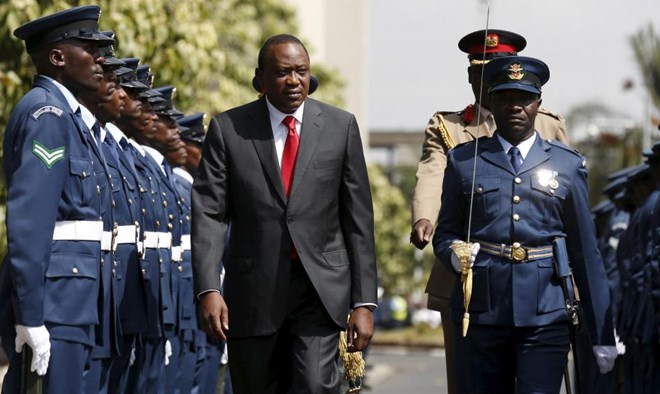 Kenya's President Uhuru Kenyatta inspects a guard of honor before the annual State of the Nation address in the capital Nairobi on March 31, 2016. © 2016 Reuters