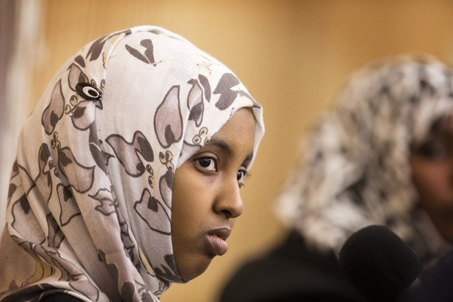 Hafsa Abdi, a senior at Technical High School in St. Cloud who participated in a walk-out from school in April 2015 to protest bullying and discrimination, participates in a forum discussion entitled "Muslims in Minnesota: A community conversation" held by Minnesota Public Radio at St. Cloud Library on Thursday, January 28, 2016. Photo by: LEILA NAVIDI
