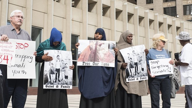 Protestors gather after closing arguments in the trial of three Twin Cities men accused of trying to join the ISIS terror group in Syria at the Federal Courthouse in Minneapolis on May 31. Courtney Perry for MPR News
