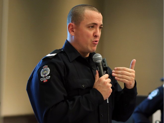 Sgt. Ryan Ferry, left, and Sgt. Michelle Horochuk talks about Managing Bias at EPS Victim Services Conference for Families of Missing or Murdered Persons at Delta South Hotel on October 1, 2015 in Edmonton, Alta. Perry Mah/Postmedia