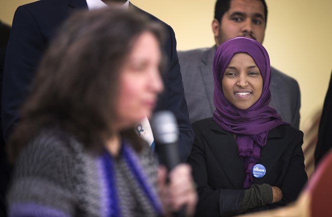 Ilhan Omar, who is running for state representative, looks on at a news conference Tuesday to address the alleged profiling of Muslims by the TSA at Minneapolis-St. Paul International Airport. LEILA NAVIDI – STAR TRIBUNE