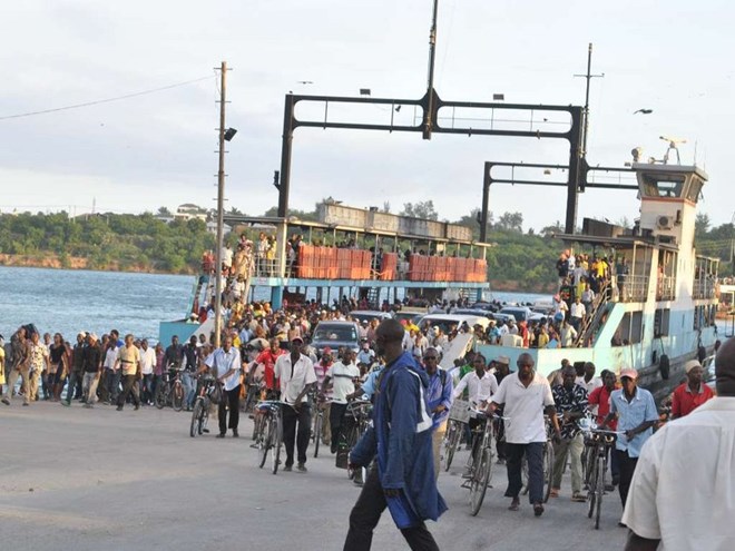 Commuters at Likoni Ferry channel in Mombasa county which is among those that the US warned its citizens against visiting over terror threats. /FILE