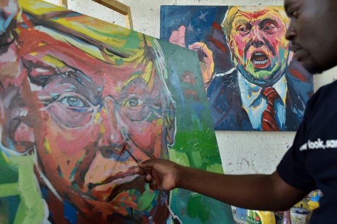 Kenyan artist Evans Yegon, also known as Yogonizer, works on his painting of U.S. President-elect Donald Trump at his workshop at the GoDown art Centre in Nairobi on December 15, 2016. Trump has had very little to say on U.S. policy towards Africa since his election victory.