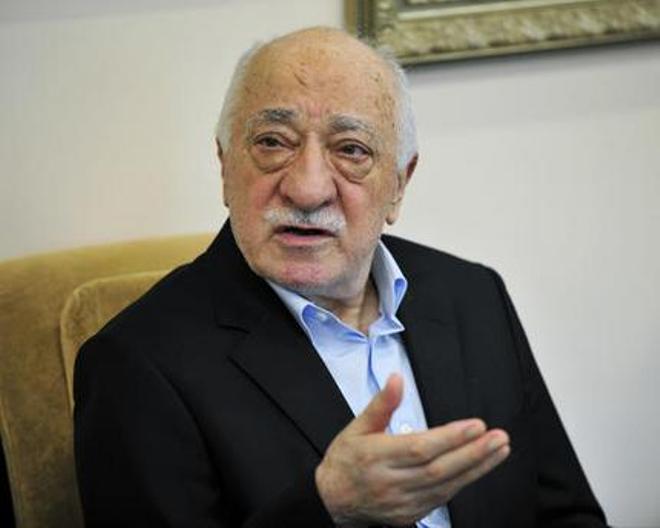 FILE - In this July 17, 2016 file photo, Islamic cleric Fethullah Gulen speaks to members of the media at his compound in Saylorsburg, Pa. While Turkish President Recep Tayyip Erdogan travels with a big business delegation to Tanzania, Mozambique and Madagascar this week, he is also focusing on what he calls a security threat. Turkey accuses international schools inspired by Muslim cleric Fethullah Gulen of providing militant recruits for his movement, which in turn says an increasingly authoritarian government is casting as wide a net as possible for perceived opponents. (AP Photo/Chris Post, File)