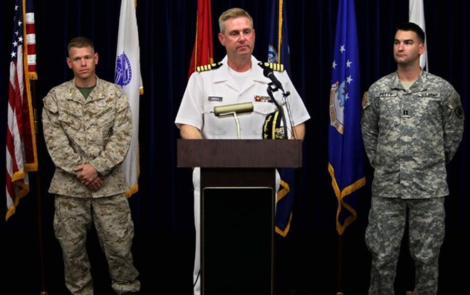 John F. Murphy, center, argued as the chief military prosecutor that Ahmed Abdulkadir Warsame should be prosecuted at Guantánamo, citing the risks with a civilian trial.
