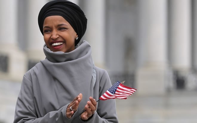 Rep. Ilhan Omar (D-Minn.) rallies with fellow Democrats before voting on H.R. 1, For the People Act, on the East Steps of the U.S. Capitol March 08, 2019 in Washington, D.C. (Photo: Chip Somodevilla/Getty Images)