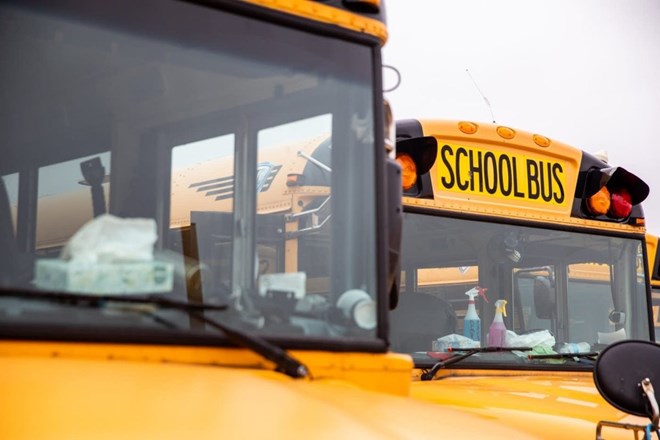 Sanitizing supplies sit on the dashboards of school buses in North St. Paul, March 2020. Credit: Evan Frost | MPR News file