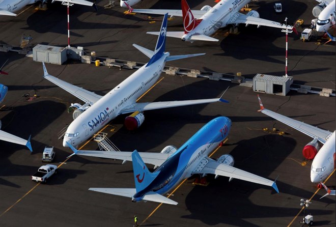 Boeing 737 Max aircraft are parked in a parking lot at Boeing Field in this aerial photo over Seattle, Washington, U.S. June 11, 2020. REUTERS/Lindsey Wasson/File Photo