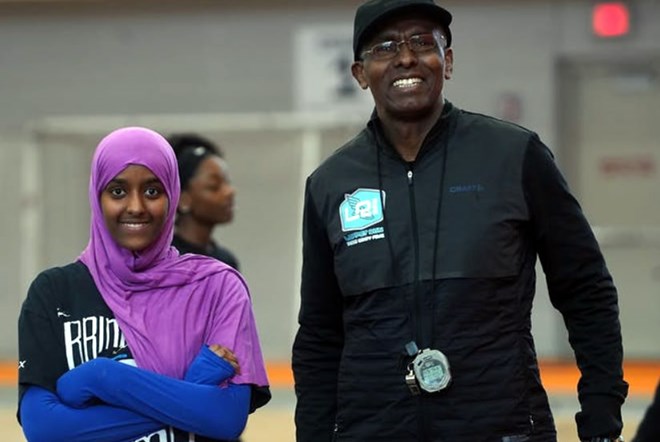 Abdi Bile, right, worked over the summer with Ayan Yusuf,18. Ayan had plans to run for Minneapolis South High School.RICHARD TSONG-TAATARII – MINNEAPOLIS STAR TRIBUNE