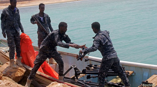 Somali Puntland forces receive weapons seized in a boat on the shores of the Gulf of Aden in the city of Bosasso, Puntland region, Somalia September 23, 2017.