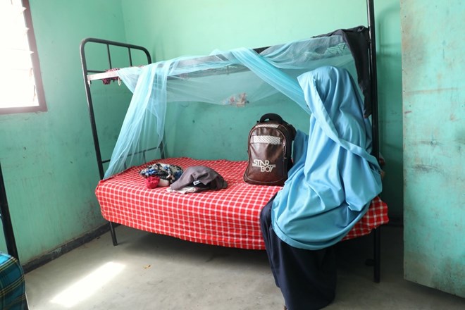 A 12-year-old child's belongings at a children’s centre. Amira was rescued two months ago by her step-brother from an attempted marriage to a 70-year-old man. The marriage was set up by her uncle in exchange for a small dowry of cows. [Odhiambo/UNICEF]
