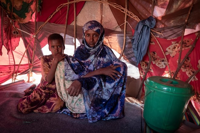 Fatuma Mohamed, aged 30, and her eight-year-old daughter Naney Adam Abdi have been in the makeshift IDP camp in Dollow, Somalia for three-and- a-half months. They are from Ethiopia. She says "we were in a camp in Ethiopia but we didn't have enough water or food. The drought was bad before but this time we have no animals and no farm". [Rich/UNICEF]
