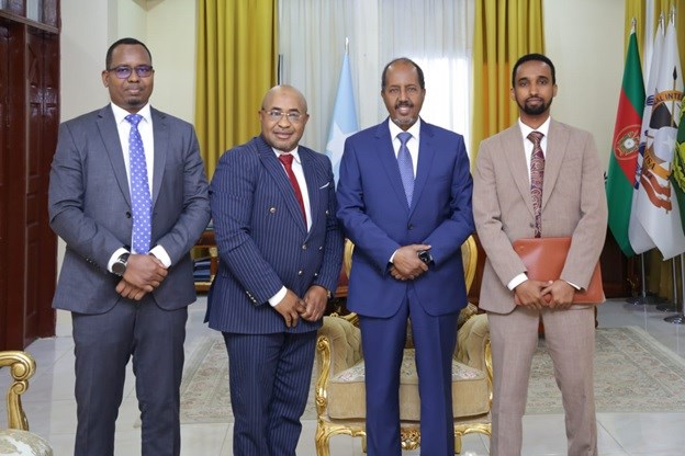 From Right: Upeace Somalia Country representative Dr Mohamed Osman, Somalia’s President H.E  Hassan Sheikh Mohamud, UPEACE Regional Director Programme, Professor Samuel Kale Ewusi,  , and Chief of Staff Office of The President of the Federal Republic of Somalia Dr. Hussein Sheikh