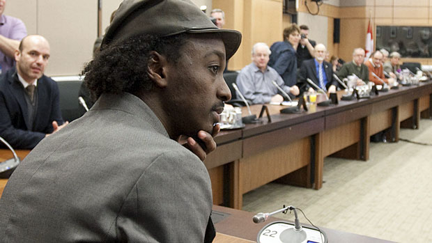 Canadian musician K'naan attends an NDP caucus meeting in Ottawa on Wednesday. He was on Parliament Hill to support an NDP bill on generic drugs for the developing world.