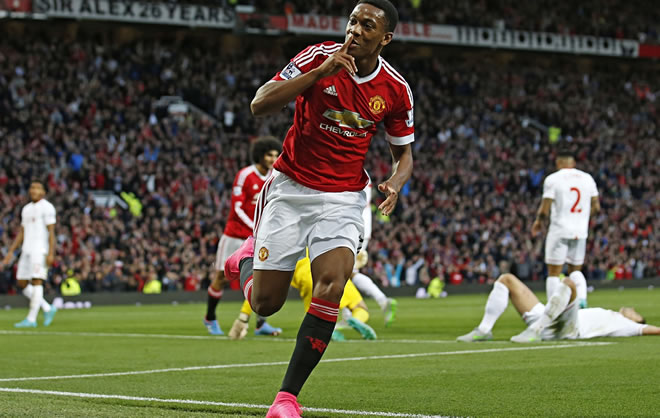 Sports: Martial makes splash as Manchester United down ...