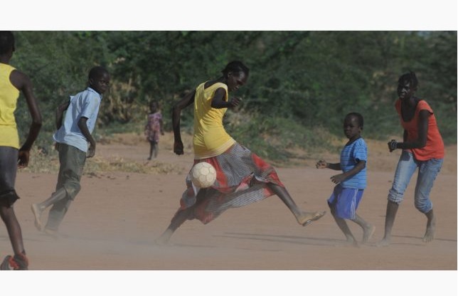 Amid the sadness and the struggle, residents have turned to sports or music. On the road from the camps and UN refugee agency compound, this girls’ soccer team practices each day, with dreams of one day playing professionally.