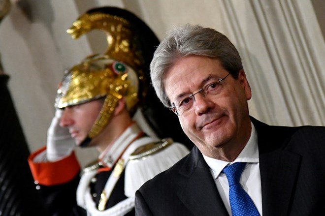 Paolo Gentiloni, Italy’s new prime minister, arrives for a press conference in Rome on December 11, 2016 © AFP / Alberto PIZZOLI