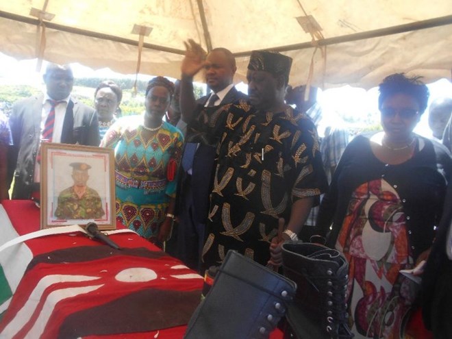 FALLEN HERO: Cord leader Raila Odinga at the funeral of Private Elias Kirionki at Osupuko village, Trans Mara West subcounty, yesterday.