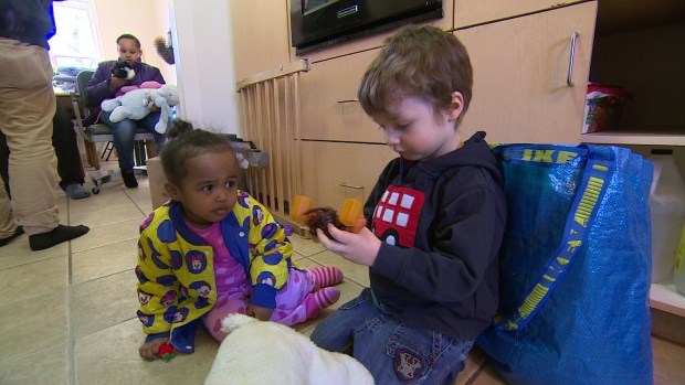Kinda, almost two-years-old, makes a new friend in Canada. (CBC)