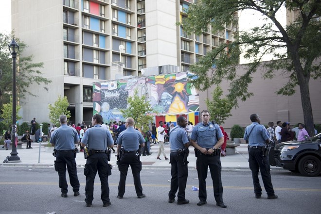 Officers man the area where K'naan's stage was set up on Saturday, Sept. 10, 2016 in the Cedar- Riverside neighborhood. The stage was taken down after protesters cut his performance short. Photo by: Easton Green