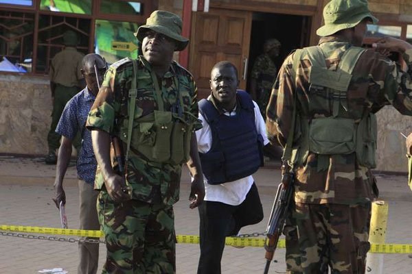 Mandera County Police Commander Bernard Nyakwaka (left) at the scene of an attack by suspected al-Shabaab terrorists in Mandera on January 23, 2017. PHOTO | MANASE OTSIALO | NATION MEDIA GROUP