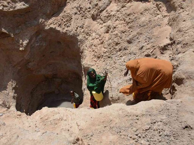 Some of residents in Geylab village in Modogashe sub-county in Garissa yesterday draw water from temporary boreholes for drinking and for domestic use,