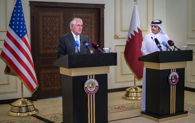 In this Tuesday July 11, 2017 photo U.S. Secretary of State Rex Tillerson, left, and the Qatari Minister of Foreign Affairs Sheikh Mohammed bin Abdulrahman Al Thani take part in a press conference in Doha, Qatar. Tillerson arrived in Qatar as he tries to mediate a dispute between the energy-rich country and its Gulf neighbours. (Alexander W. Riedel/US State Department via AP)