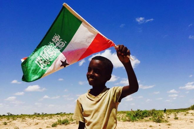 Photo: A boy waves the Somaliland flag.