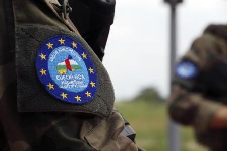 The logo of EUFOR-RCA European Union force is seen on a French soldier"s uniform as they control a checkpoint at Bangui airport May 1, 2014.