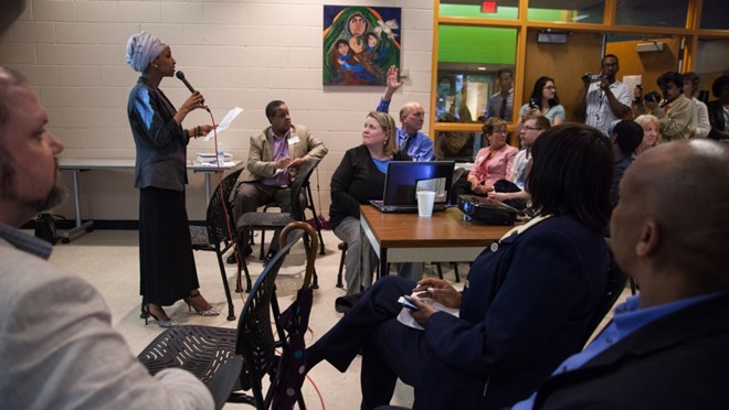 Minnesota State Rep. Ilhan Omar addresses a crowd of more than 30 people gathered during a meeting she called to address measles and vaccination at the Brian Coyle Community Center in the Cedar-Riverside neighborhood of Minneapolis on Wednesday, May 17, 2017.