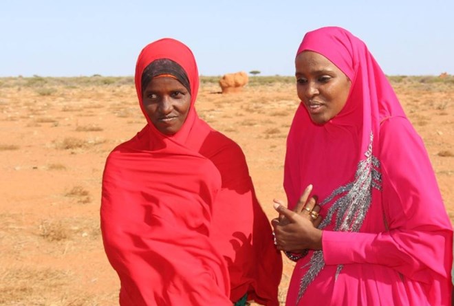 Fadumo Cusman , mother of Deeqa Nuur, a 10-year-old Somali girl who died from FGM, is pictured (left) with anti FGM campaigner Ifrah Ahmed while filming a documentary in Lasoley, central Somalia, August 11, 2018. Photo by Nuur Mohamed Bare. Ifrah Foundation/Global Media Campaign to End FGM Image Caption and Rights Information