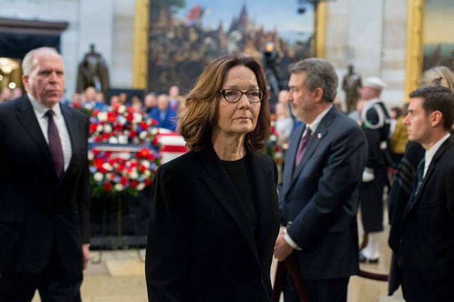 CIA Director Gina Haspel visits the casket containing former president George H.W. Bush’s remains at the U.S. Capitol on Dec. 4. (Michael Reynolds/EPA-EFE/Shutterstock)