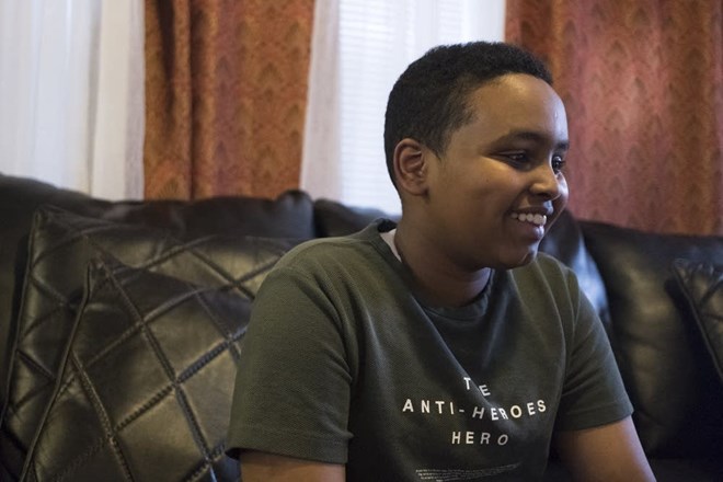 Yusuf Dayur, 14, has made viral videos in response to political news, his most recent being a response to President Trump's comments about African nations. Evan Frost | MPR News