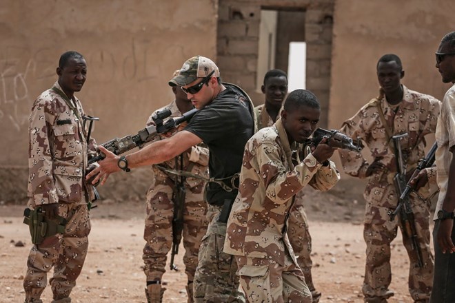 An American Special Forces soldier training Nigerien troops during an exercise in April outside Agadez, Niger.