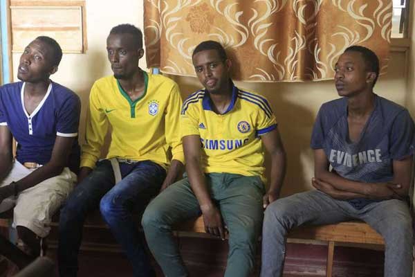 Terror suspects (from left) Mohamed Ali Hussein, Abdullahi Hassan, Said Ibrahim and Abdiwahab Ali Hussein in the Mandera Law Courts on Tuesday, November 10, 2015. Police have arrested three terrorism suspects in Nyeri County and put key installations in Mt Kenya under surveillance. PHOTO| MOSES OTSIALO | NATION MEDIA GROUP