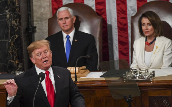 President Trump, in front of Vice President Pence and House Speaker Nancy Pelosi (D-Calif.), delivers his State of the Union address before members of Congress on Feb 5. (Toni L. Sandys/The Washington Post)